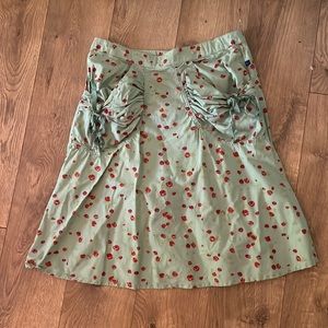 Vintage Blue Dot skirt in green/red floral, back zipper and button. Small